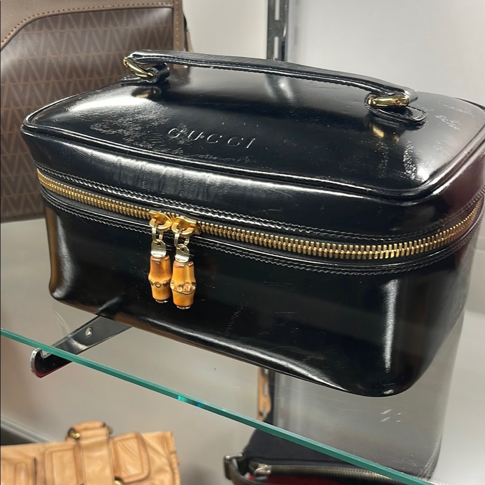 Gucci Black and Gold Toiletry Bag with Glossy Finish